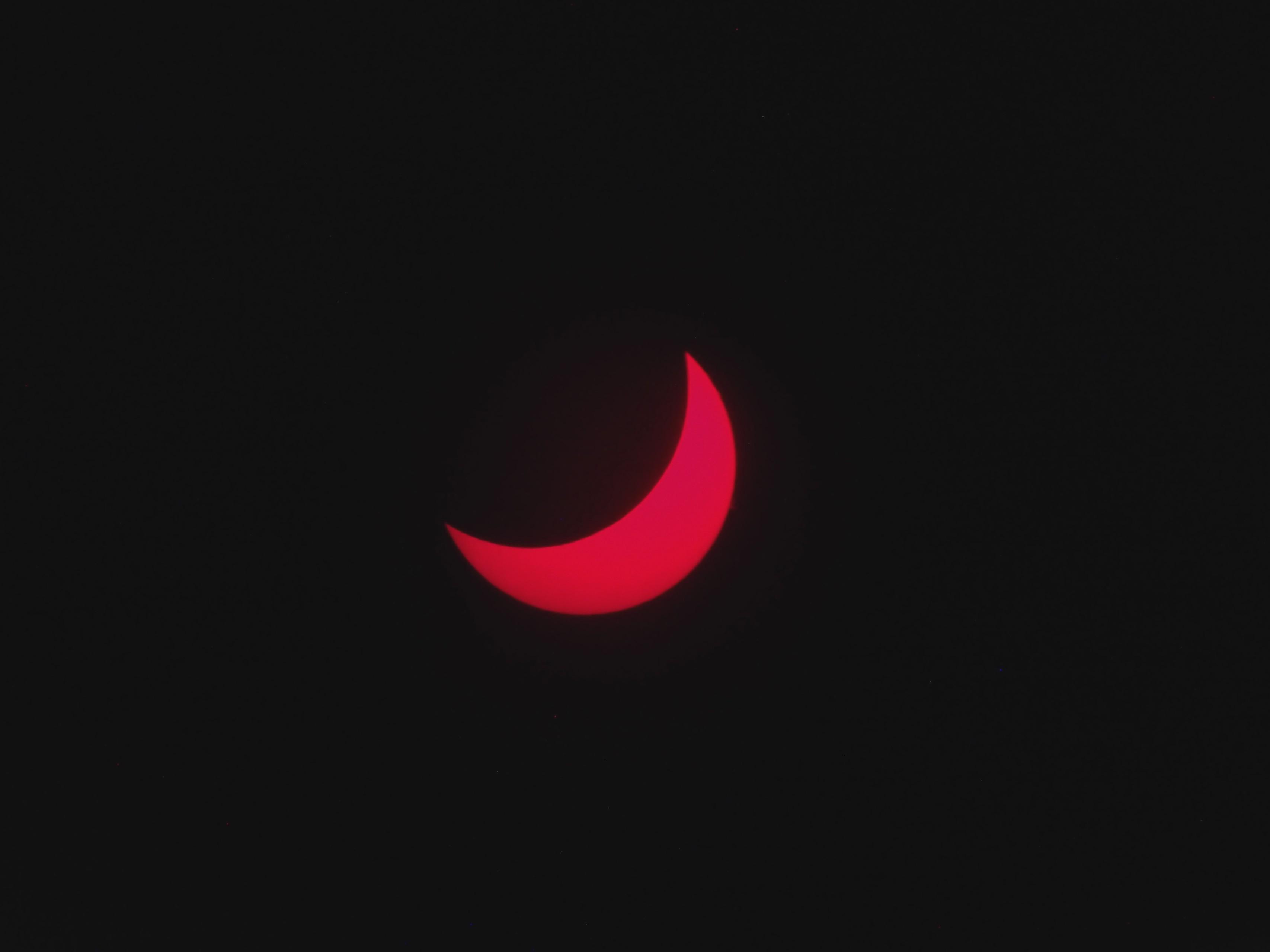 The moon eclipsing the sun, 66%